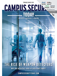 People walking in hospital hallway